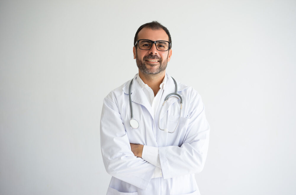 portrait-successful-mid-adult-doctor-with-crossed-arms